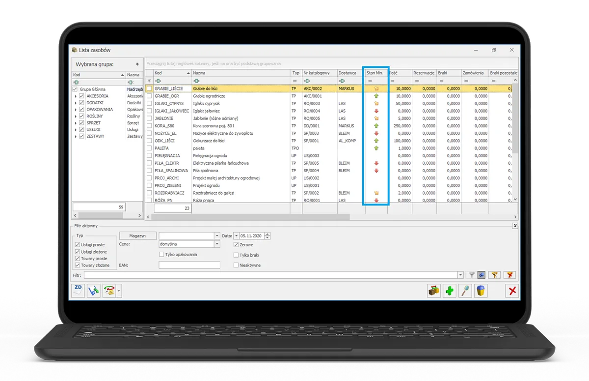 Comarch ERP Optima na laptopie: lista towarów ze stanami magazynowymi